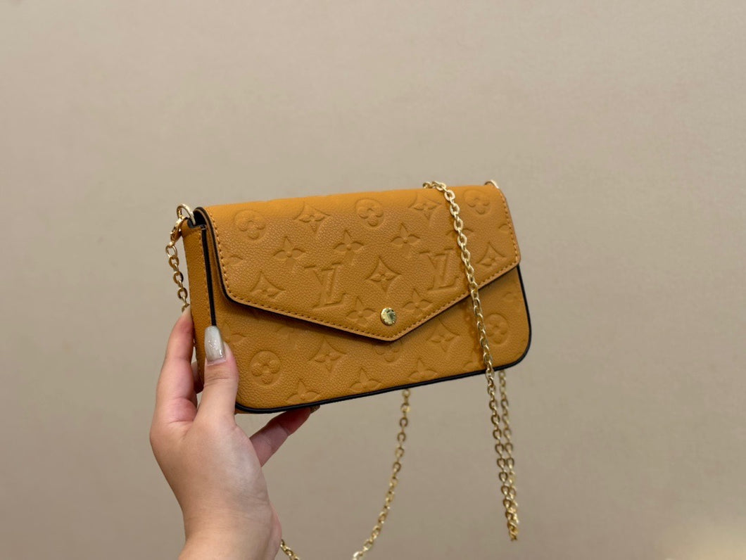 Tan LV Clutch